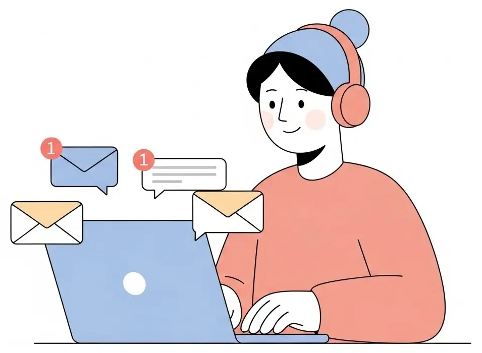 Customer support agent managing multiple emails using a unified inbox on a laptop.